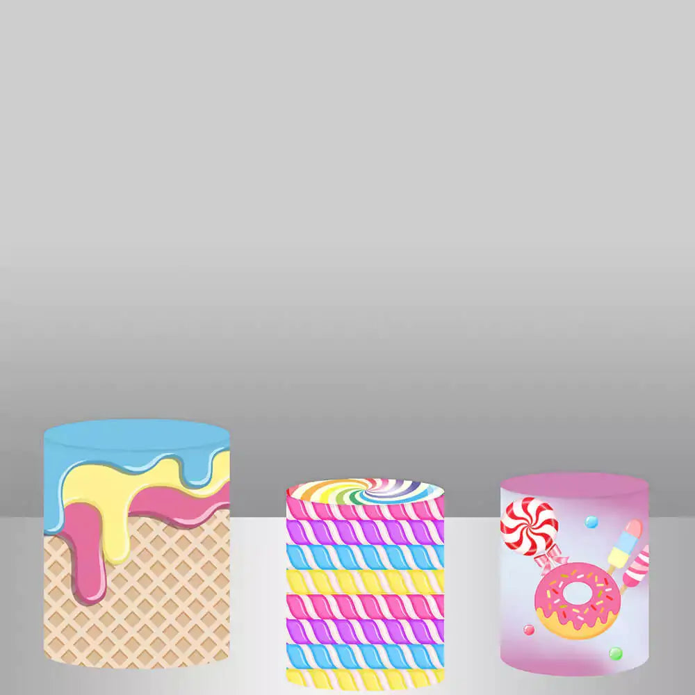 Set of three cylindrical pedestal covers featuring candy stripes, swirls, ice cream, and donut designs, perfect for completing a candy-themed party setup.