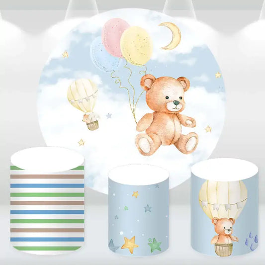 Charming party decor set featuring a Teddy Bear backdrop and matching cylinder covers with playful designs.