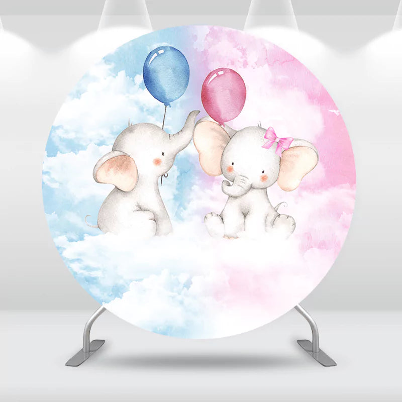 Round backdrop featuring two elephants with blue and pink balloons for gender reveal