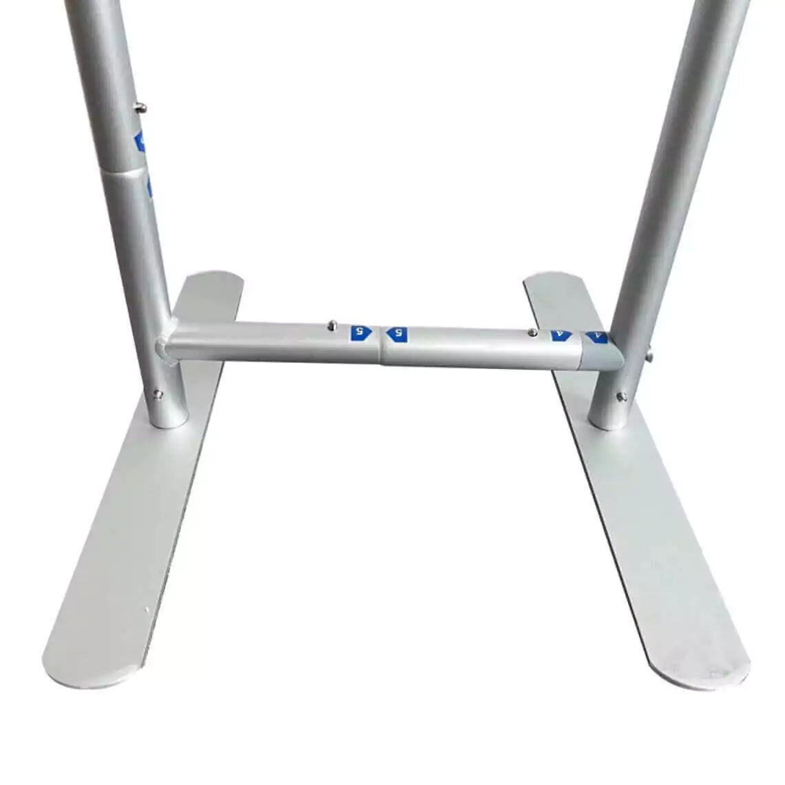 A close-up view of the base connection for an arch backdrop frame, showing two stabilizing feet attached to vertical poles with a horizontal connector. The metal pieces are secured with screws and marked with directional labels for easy assembly.