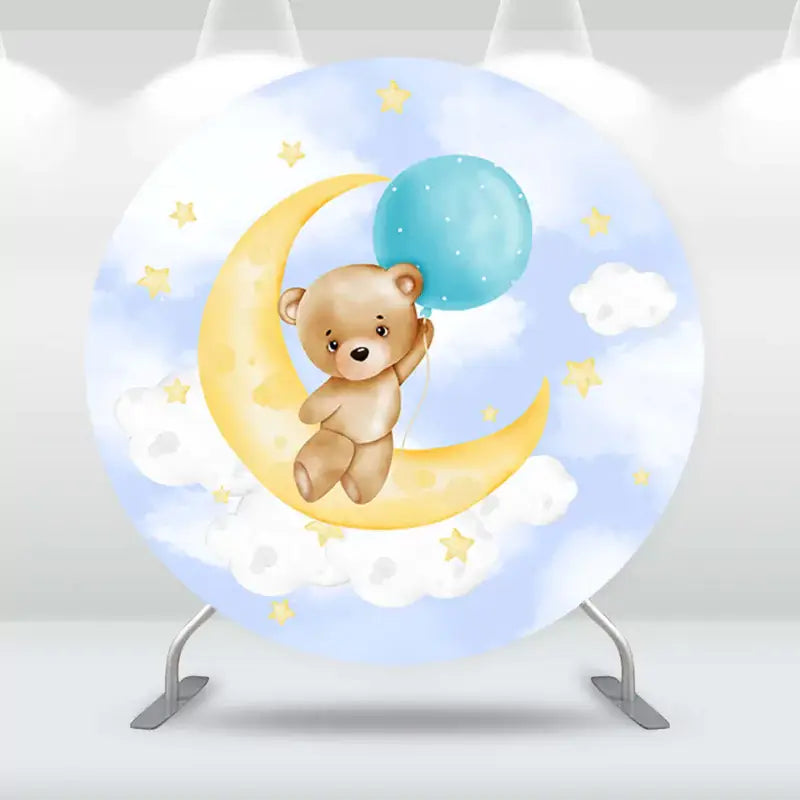 Round backdrop featuring a teddy bear on a crescent moon with stars and clouds, perfect for baby showers and kids' birthday parties.