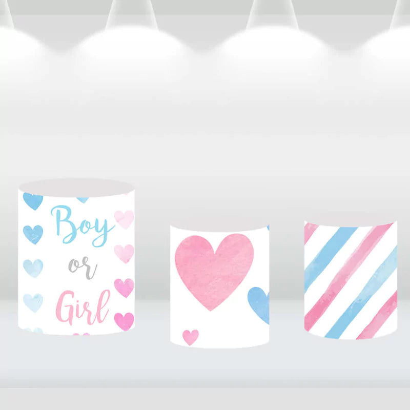 Pink and blue themed cylinder covers for gender reveal party, part of elephant backdrop set.