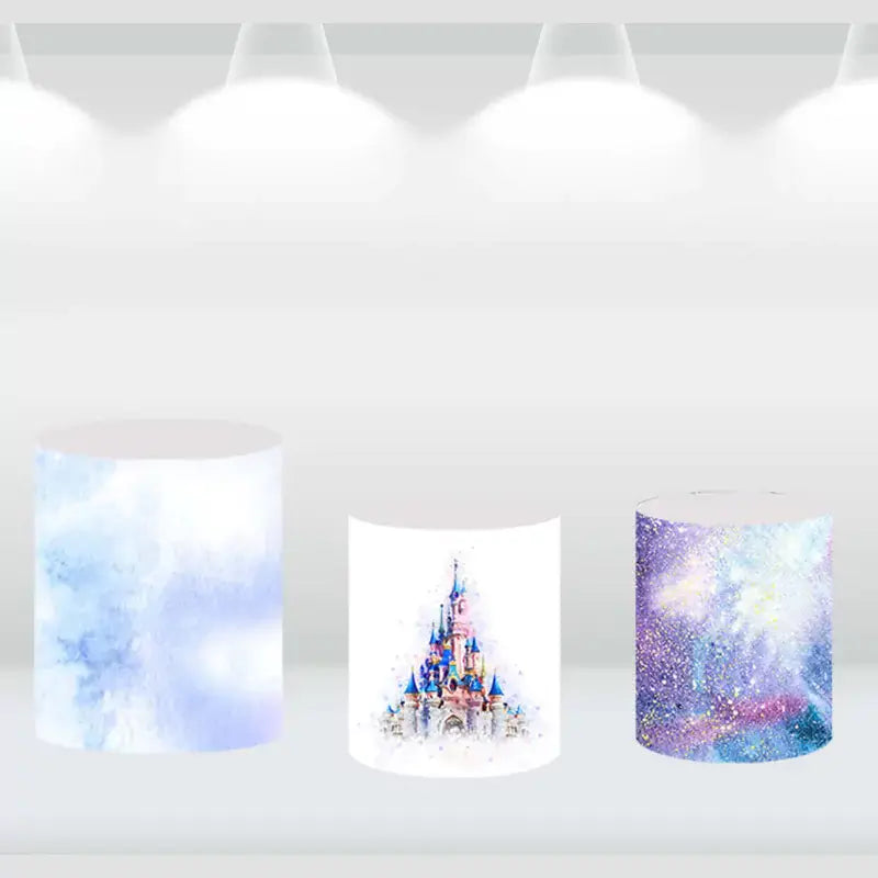 Dreamy and glittery cylinder covers in pastel hues, coordinating with the fairytale castle backdrop.