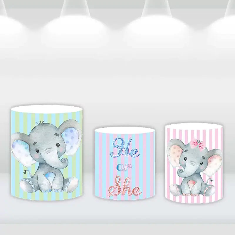 Decorative cylinder covers featuring elephants in blue and pink for gender reveal.