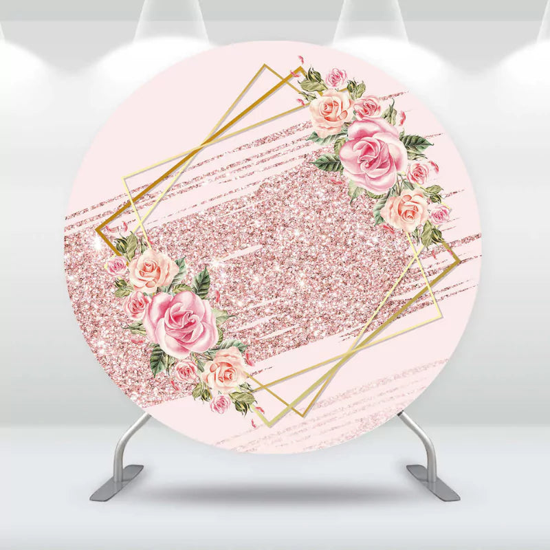 Round backdrop featuring rose gold glitter, geometric accents, and pink roses, perfect for baby showers.