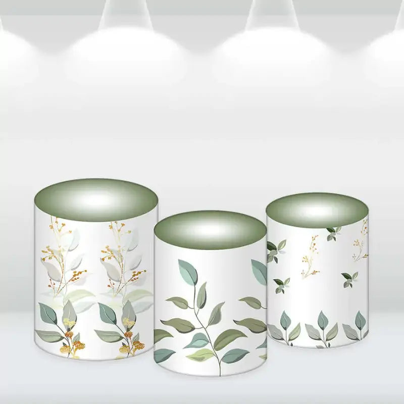 Elegant cylinder covers featuring leaves and gold accents, perfect for religious celebrations.