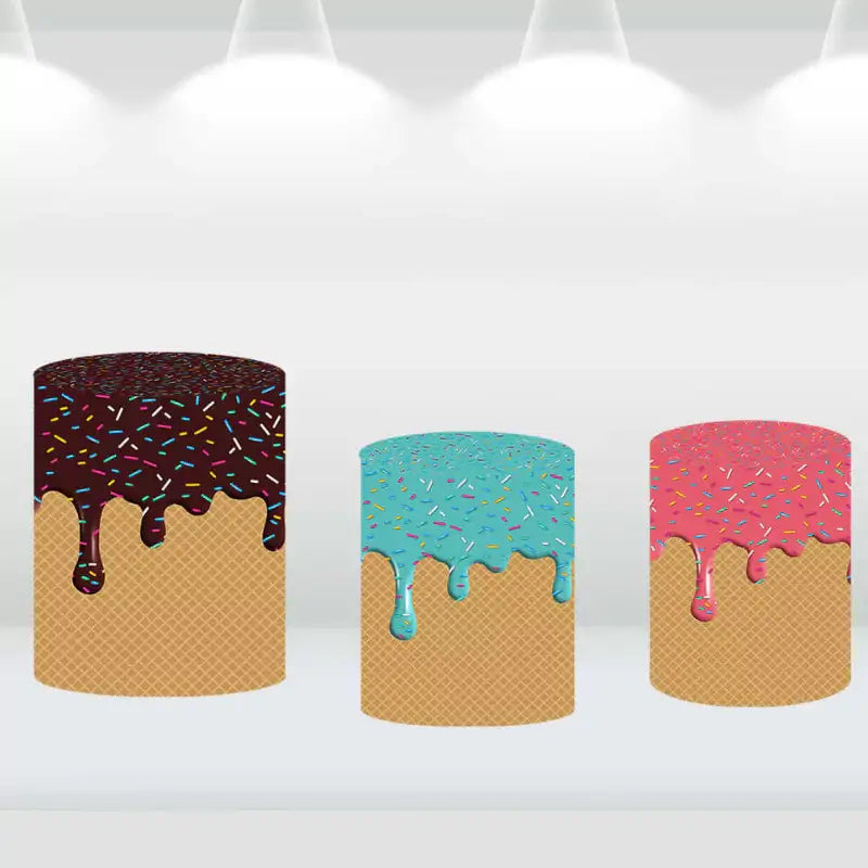 Cylinder covers with chocolate drip and sprinkle designs, matching the ice cream party theme.