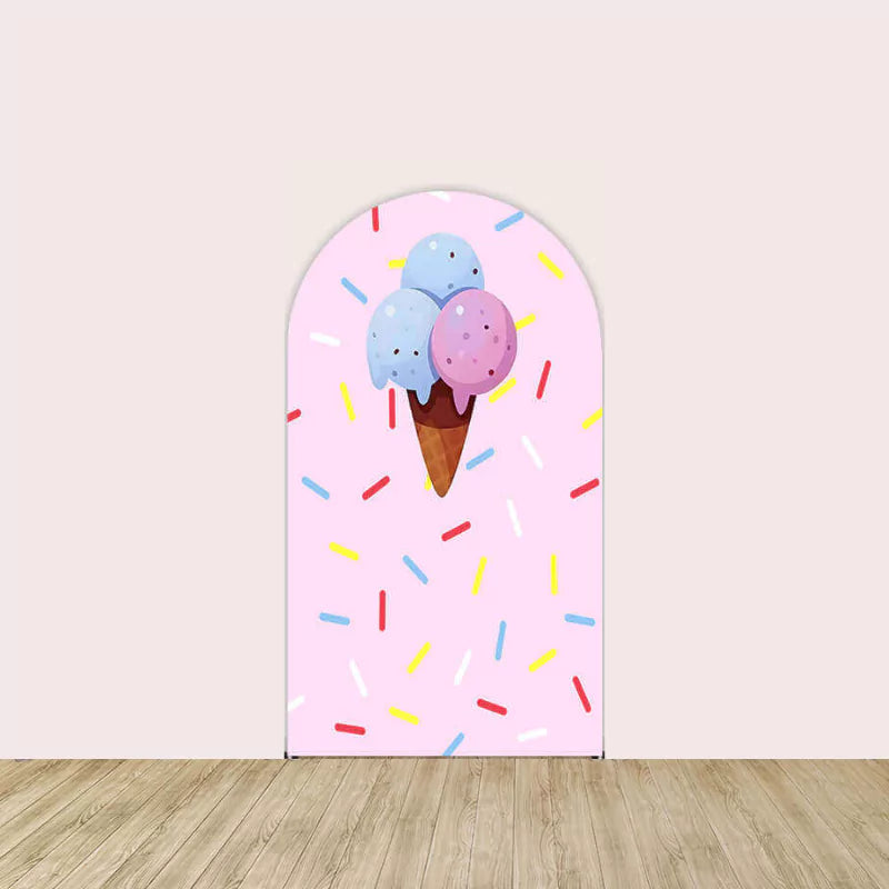 Center arch backdrop with a pink background, decorated with a large ice cream cone illustration and colorful sprinkles.
