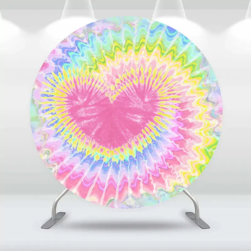 Tie-dye heart-themed round backdrop with rainbow colors and three matching cylindrical pedestal covers featuring tie-dye and heart designs.
