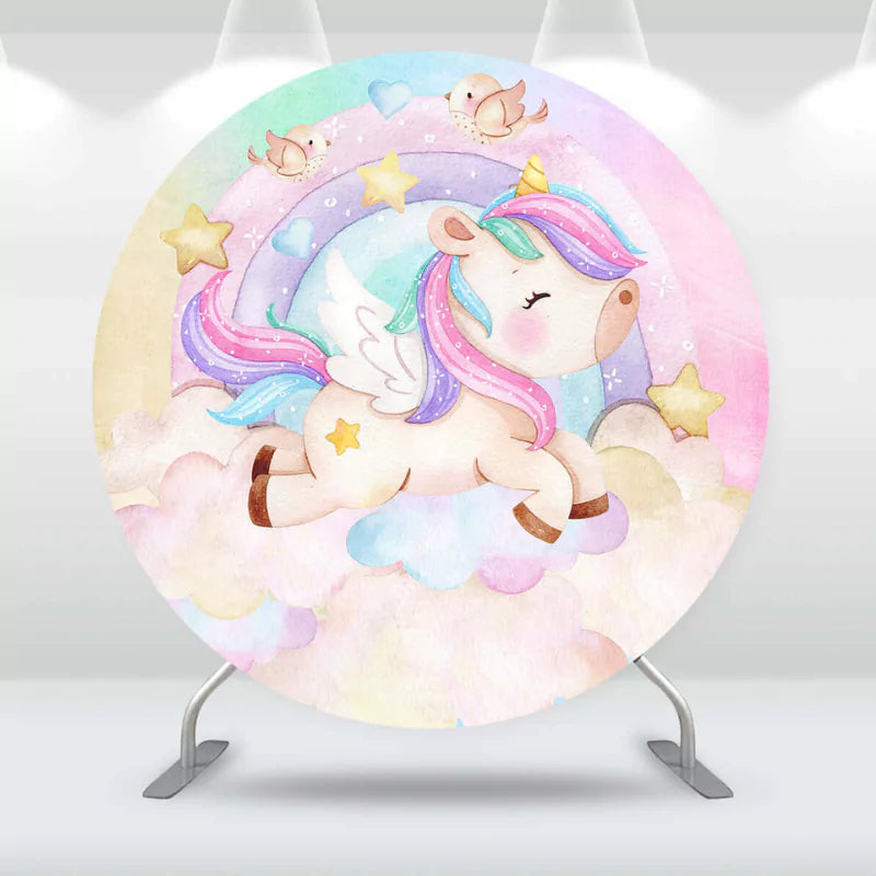 Whimsical unicorn-themed backdrop with a unicorn soaring through the clouds and a pastel rainbow background, perfect for magical events.