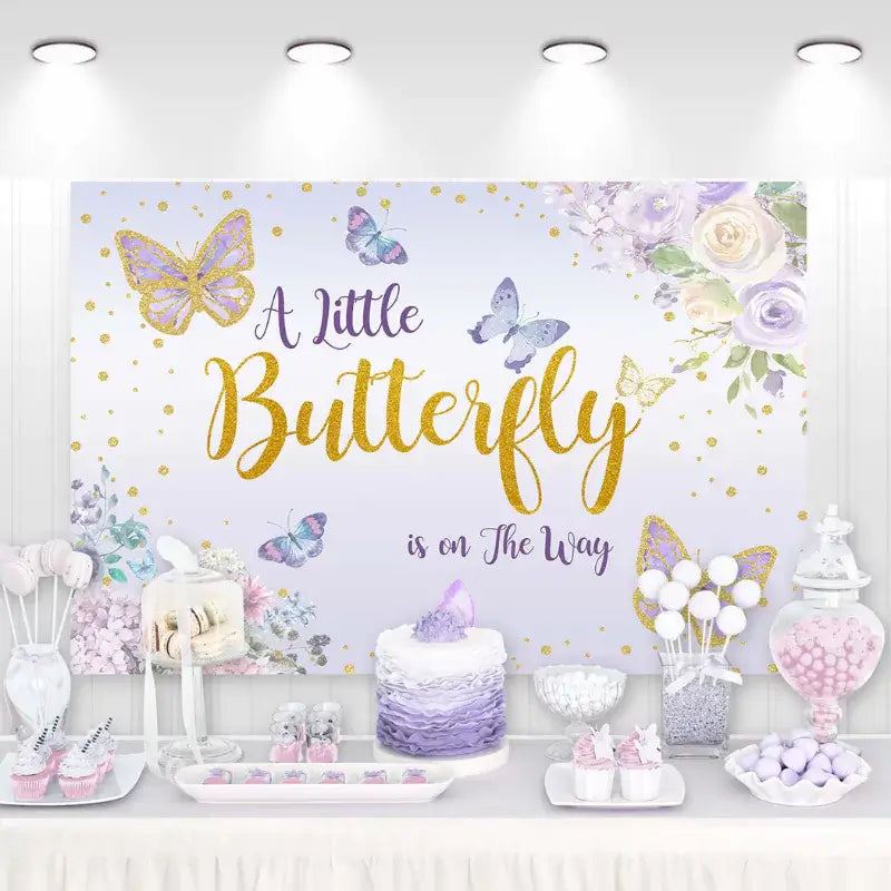 A Little Butterfly is on the Way baby shower backdrop with purple and gold butterflies, floral accents, and glitter-style script – perfect for spring or garden-themed celebrations