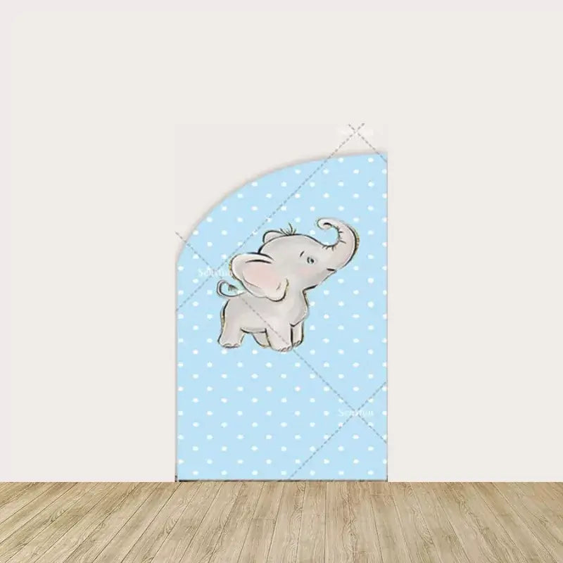 Left arch panel with a cute cartoon baby elephant on a sky-blue polka dot background.