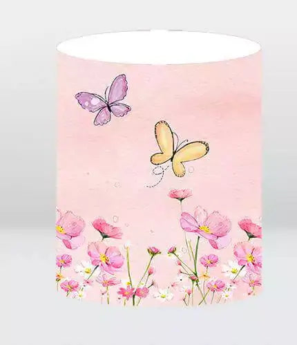 pink backdrop cylinder cover with yellow and purple butterflies over floral garden