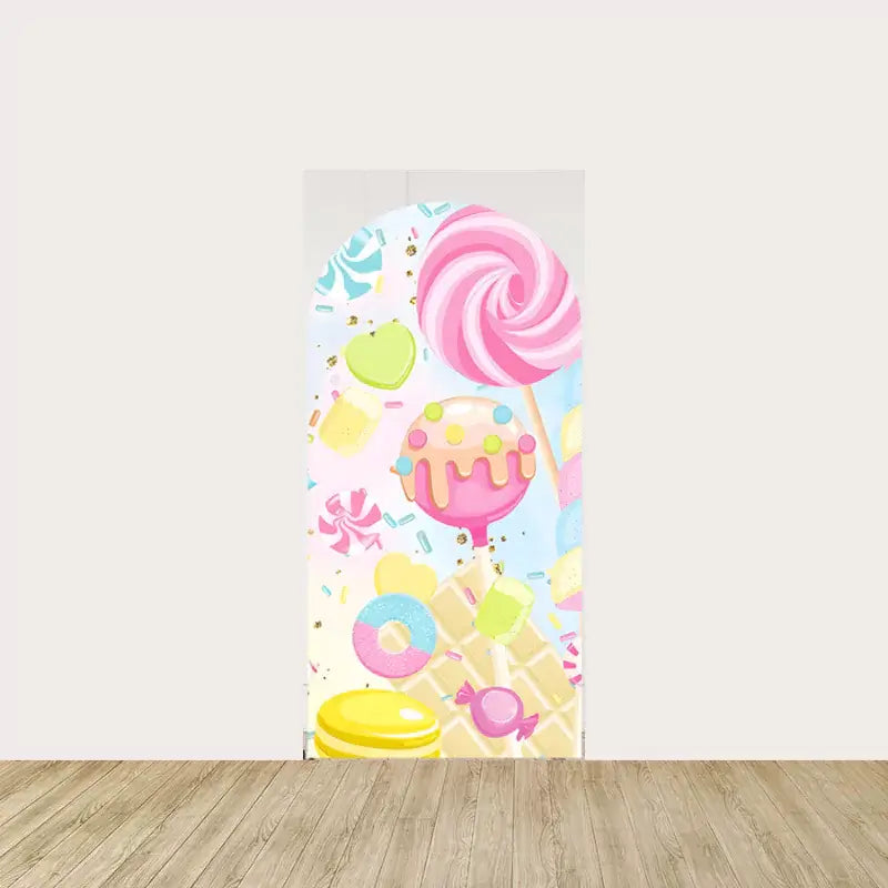 Arch backdrop with a variety of candies, including lollipops, gumdrops, and sweets, in pastel colors—perfect for a candy-themed birthday party.