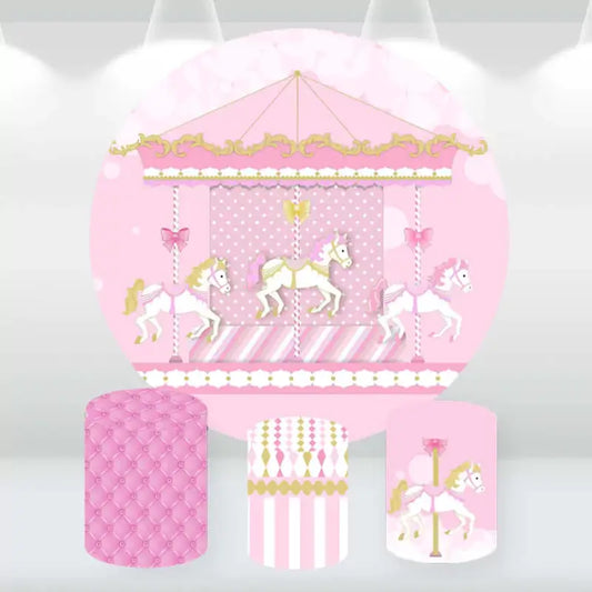 Round backdrop with pink carousel design and three cylindrical covers in coordinating pink and gold patterns, ideal for baby showers and birthday parties.