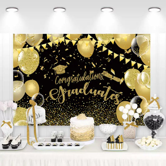 Graduation party backdrop with golden balloons, confetti, and graduation cap – perfect for celebrating graduates with a festive black and gold design