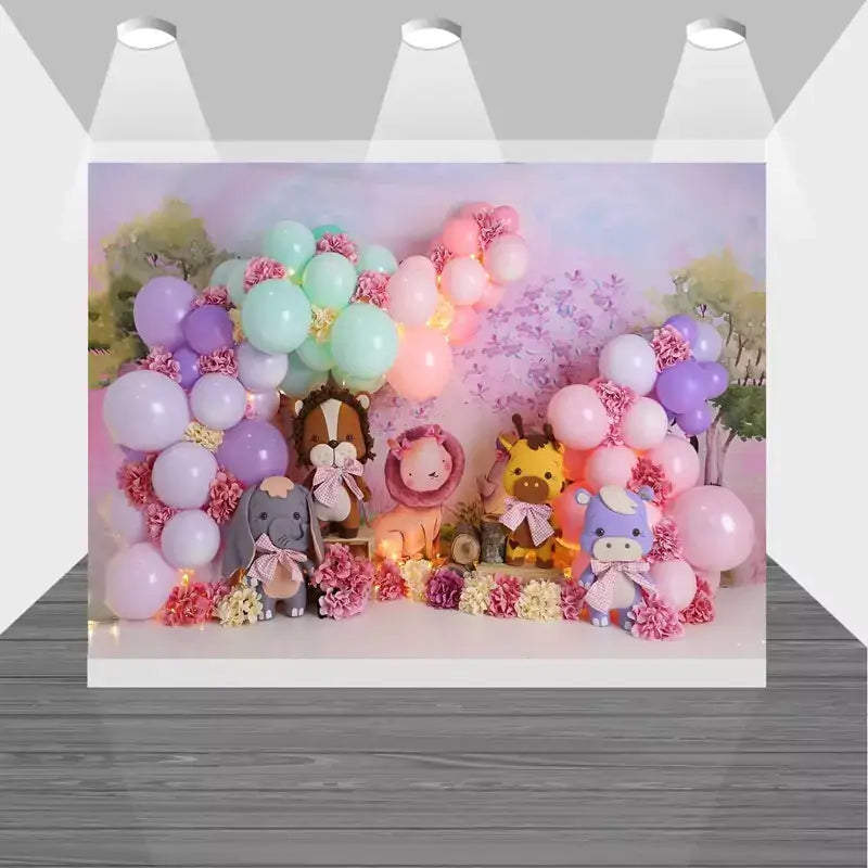 Whimsical pastel animal-themed backdrop with pink, purple, and mint balloons, floral garlands, and plush jungle animals – ideal for kids' parties or photo booths