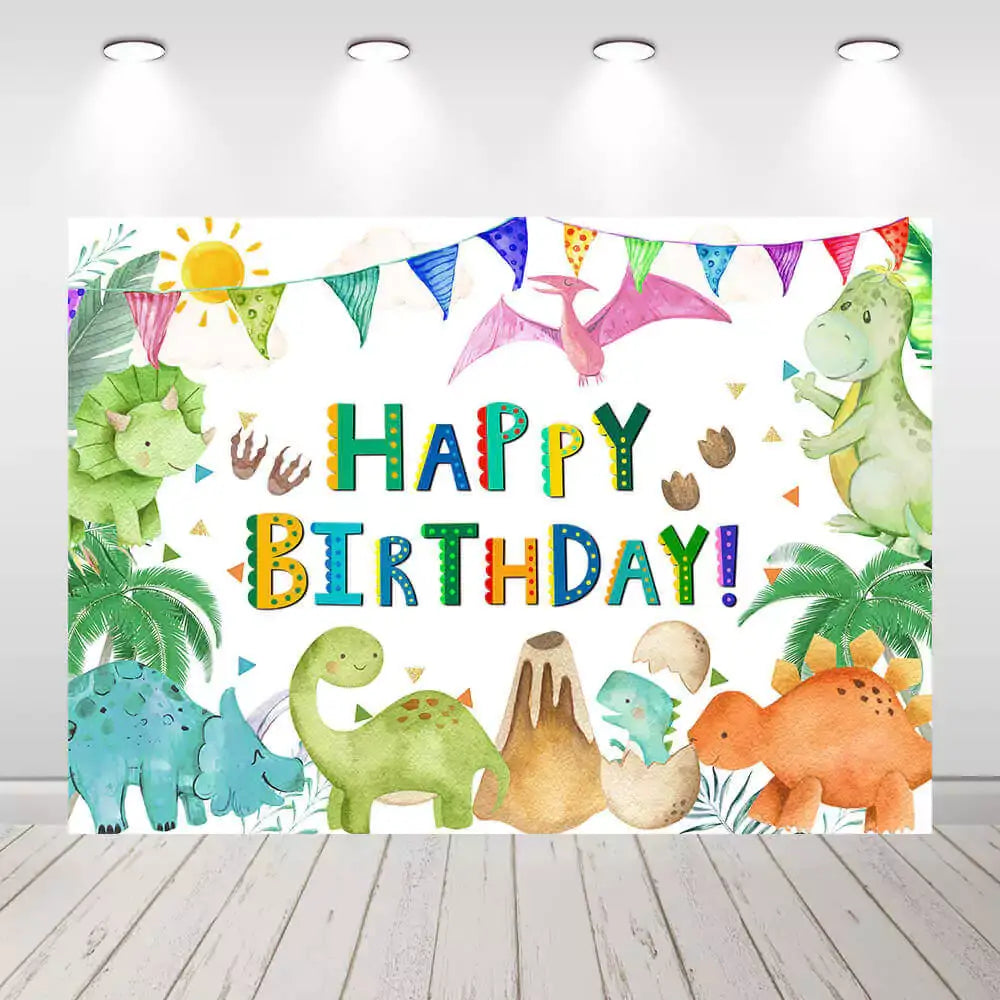 Dinosaur-themed birthday backdrop with colorful cartoon dinosaurs, volcano, tropical plants, and party bunting – perfect for a fun dino party for kids