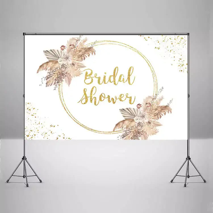 Bridal Shower party backdrop featuring gold glittery ‘Bridal Shower’ text with delicate floral accents and a white background – ideal for a classy event.