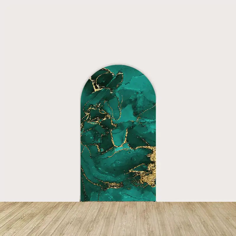 Arch backdrop with emerald green and gold marble texture pattern.