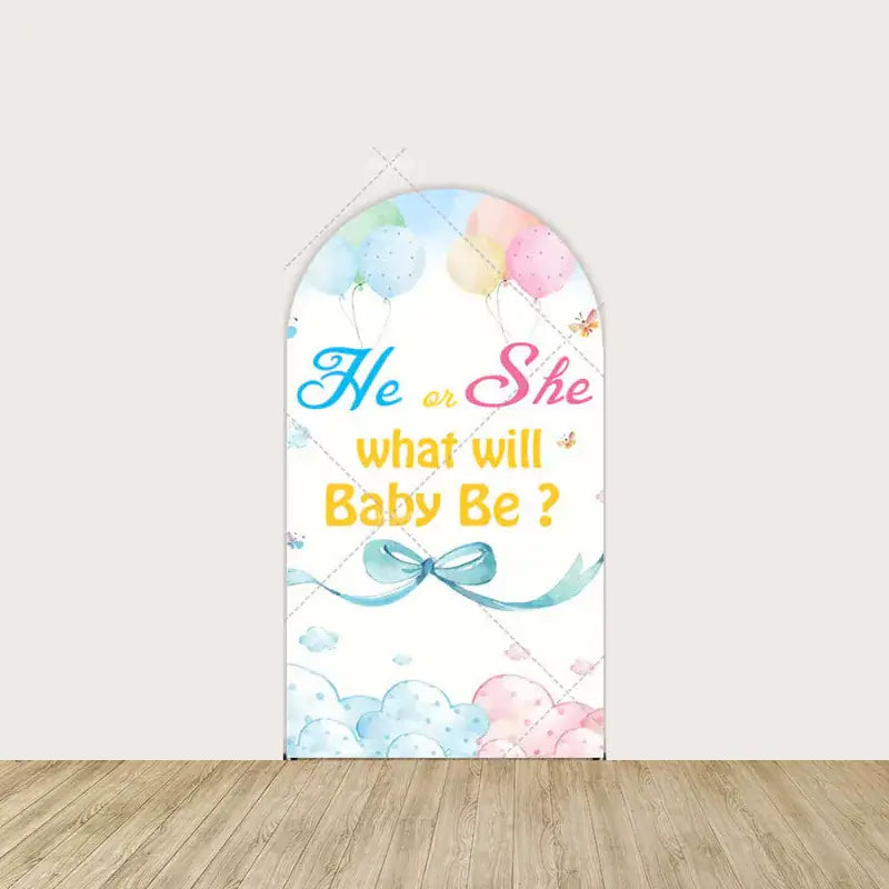 Arch panel with pastel clouds and the phrase “He or She, What Will Baby Be?” with blue bow, balloons, and yellow accent text.
