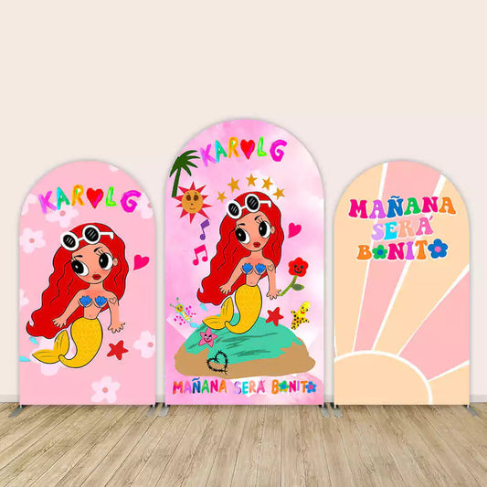 Three colorful arched backdrop panels featuring a cartoon mermaid with red hair, Karol G rainbow text, and “Mañana Será Bonito” phrase in bold letters.