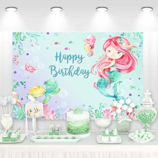 Under the sea mermaid birthday backdrop with cute red-haired mermaid, sea turtle, seahorse, bubbles, and ocean plants – perfect for a girl's birthday party.