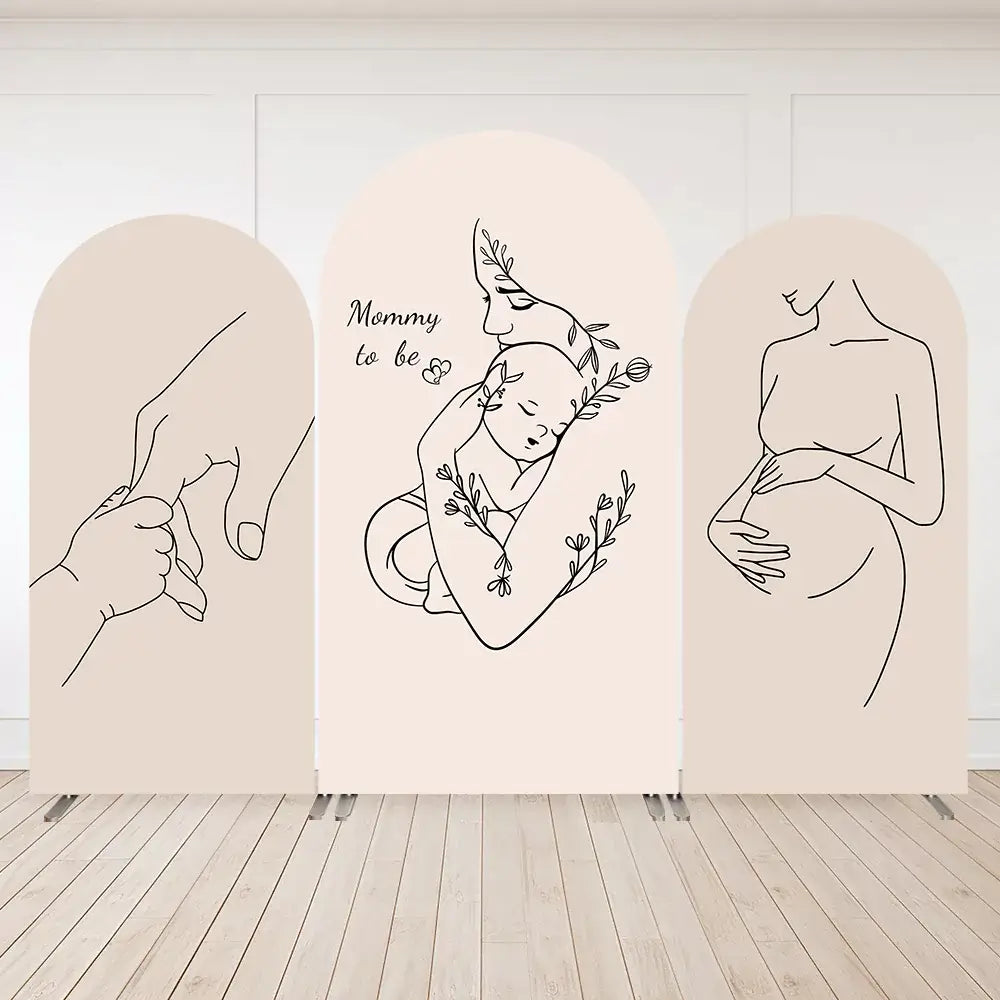Three-panel minimalist baby shower arch backdrop with line drawings of pregnant woman, mother holding baby, and baby hand holding mom’s finger.