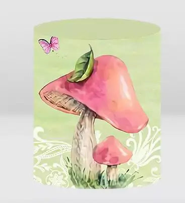 green backdrop cylinder cover with large pink mushrooms and butterfly accent
