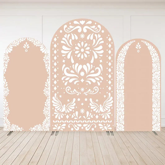 Arched backdrop cover with delicate white ornamental lace patterns on a soft beige background, ideal for weddings or boho-themed events.