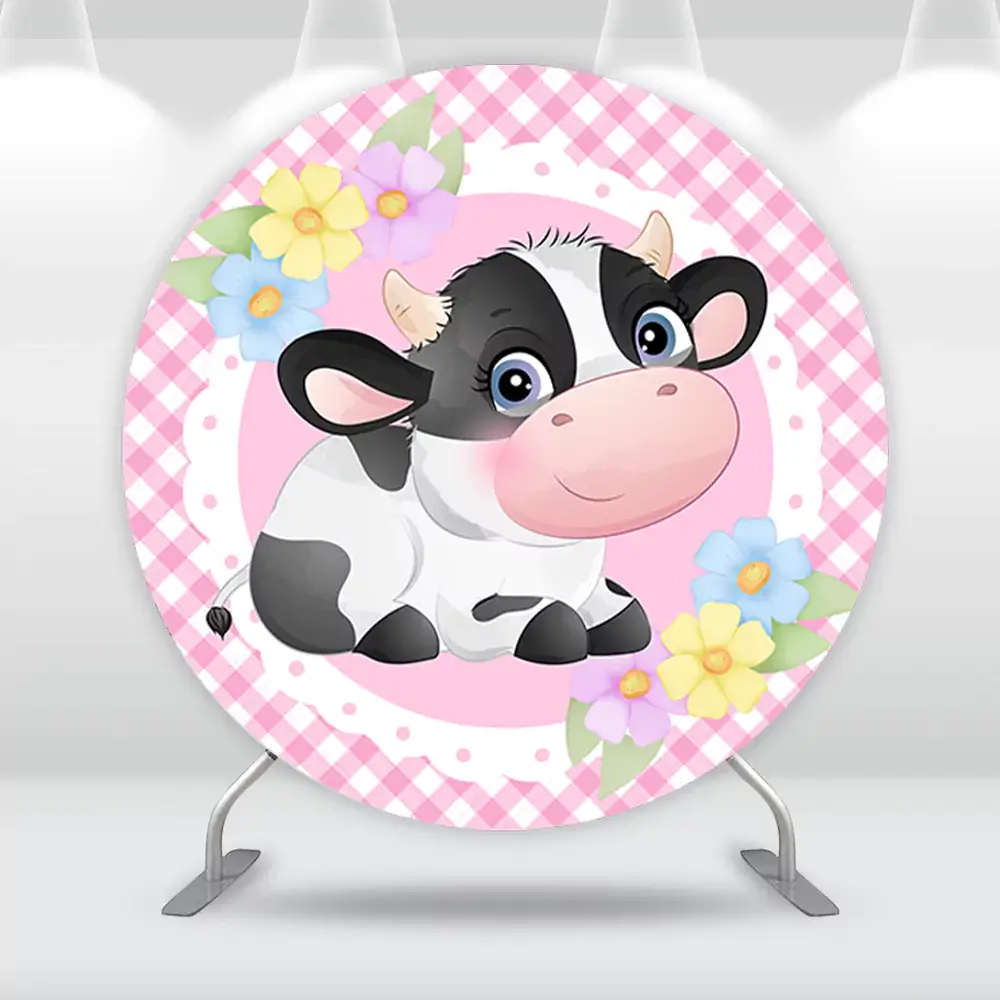 Round pink backdrop featuring a cute baby cow illustration with floral accents and a gingham border, perfect for farm animal-themed parties.