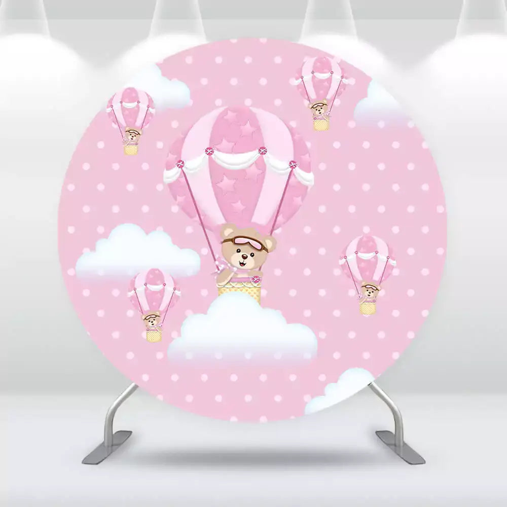 Baby girl party backdrop featuring teddy bears floating in pink hot air balloons among clouds.