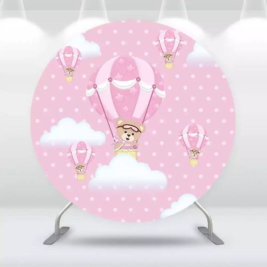 Baby girl party backdrop featuring teddy bears floating in pink hot air balloons among clouds.