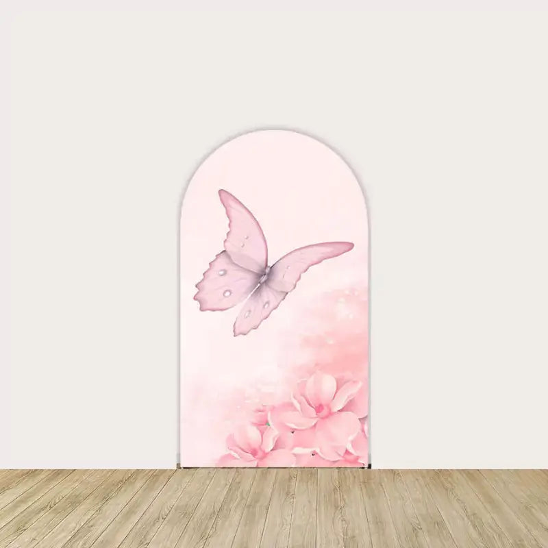Left arch with a flying pink butterfly above blush flowers on a soft pink background.