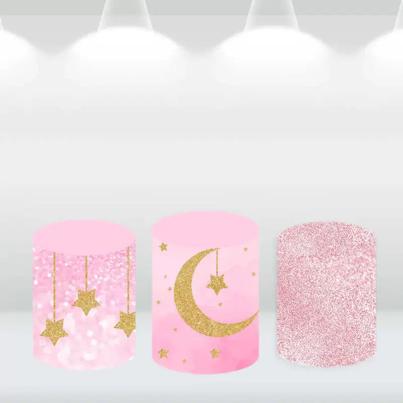 Three matching cylinder covers featuring pink glitter and hanging gold star designs, perfect for complementing a 'Twinkle Twinkle Little Star' backdrop.