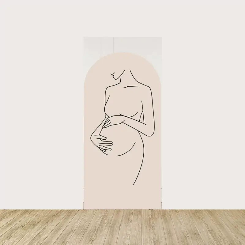 Arch panel with elegant line drawing of a pregnant woman cradling her belly—minimalist design for baby shower celebrations.
