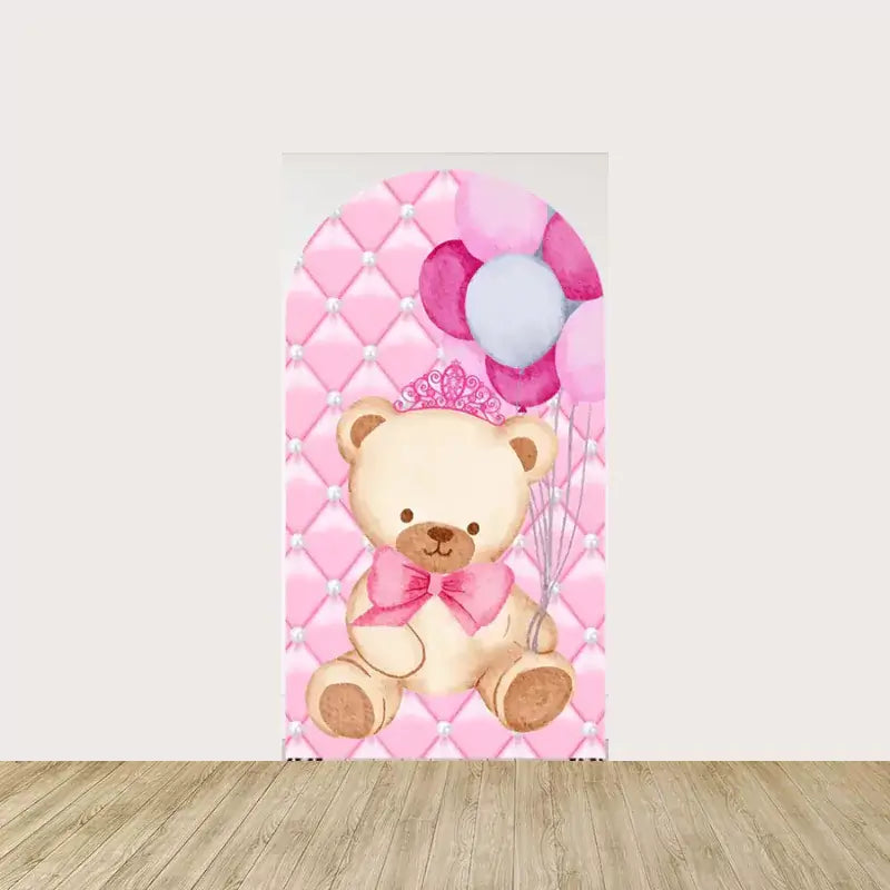 Arch panel featuring a cute teddy bear wearing a tiara and pink bow, holding pink and purple balloons, set against a quilted pearl pink background.