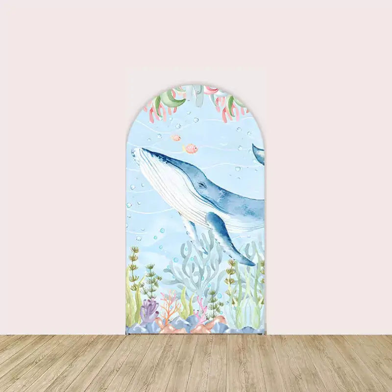Right panel featuring a large whale swimming upward with fish, coral, and seaweed against a wavy blue background.