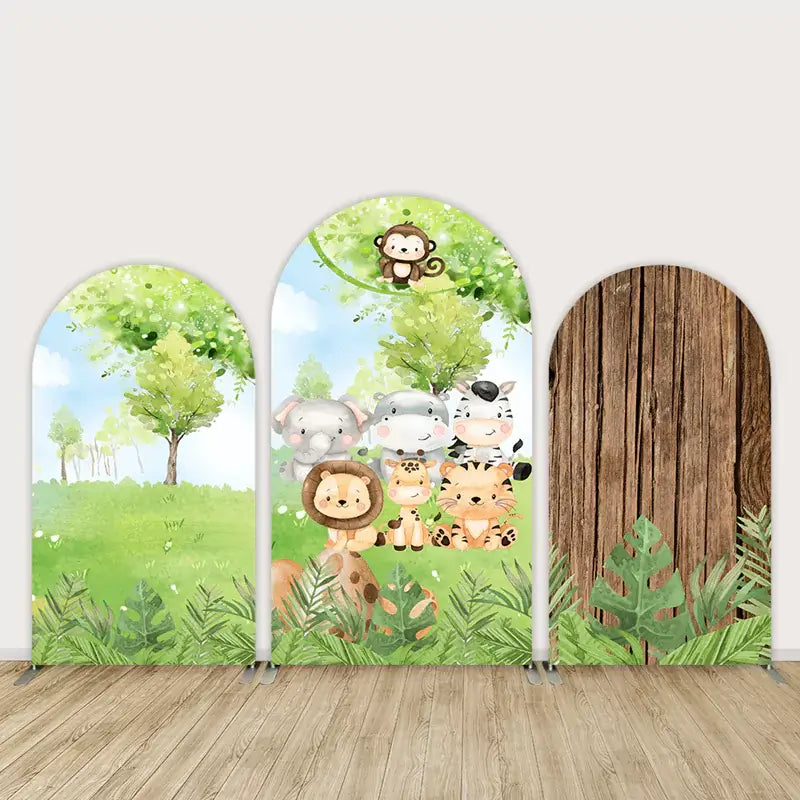 Three-panel safari arch backdrop featuring cartoon jungle animals like a lion, tiger, giraffe, elephant, zebra, and monkey with trees and greenery.