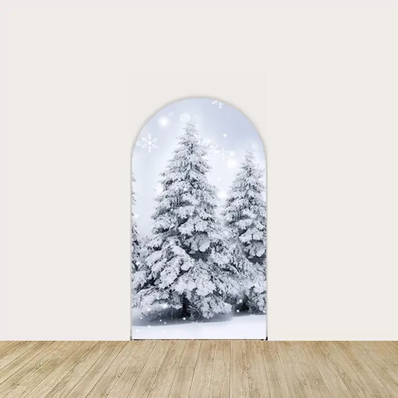 Snow-covered pine trees against a soft winter background, adding a serene and festive atmosphere to holiday events.