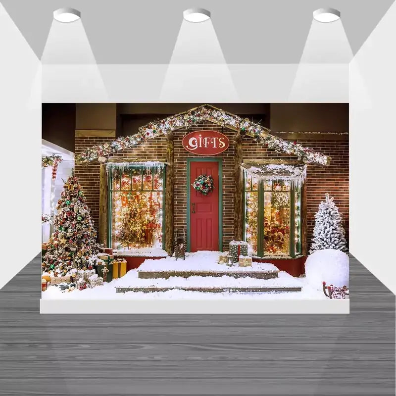 Holiday shop backdrop with red door, wreath, gift boxes, and decorated windows surrounded by snow – perfect for Christmas-themed event decor