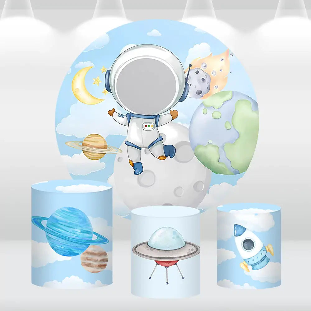 Space-themed round astronaut backdrop with matching cylinder covers featuring planets, a rocket, and a UFO, perfect for kids’ birthday parties.