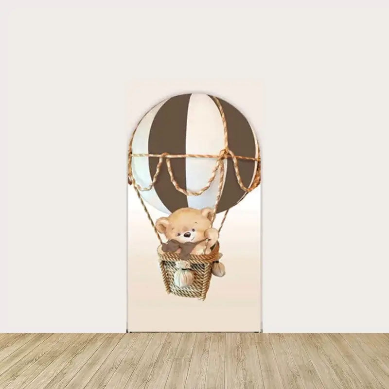 Right arch panel with a cute teddy bear riding a brown and white hot air balloon—whimsical backdrop for a gender-neutral baby shower.