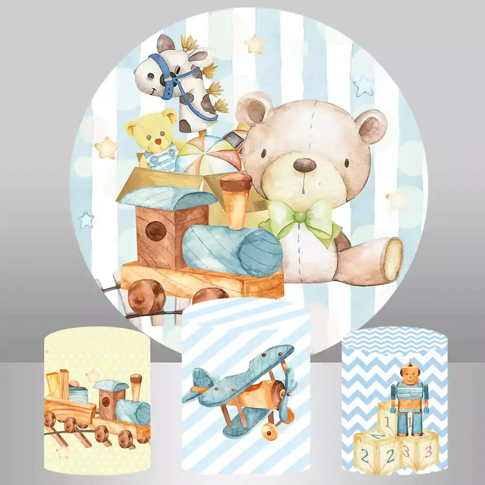 Round backdrop with teddy bear and toys like a train, airplane, and blocks, paired with three cylinder covers featuring toy-themed designs.