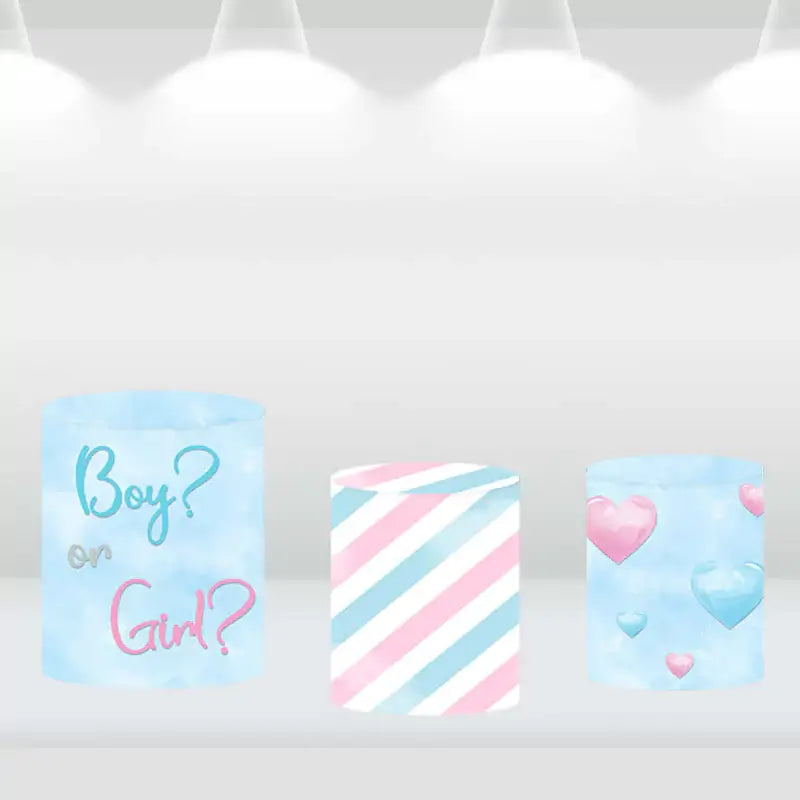 Three cylindrical covers featuring 'Boy or Girl?' text and pink and blue heart patterns, perfect for gender reveal and baby shower decorations.