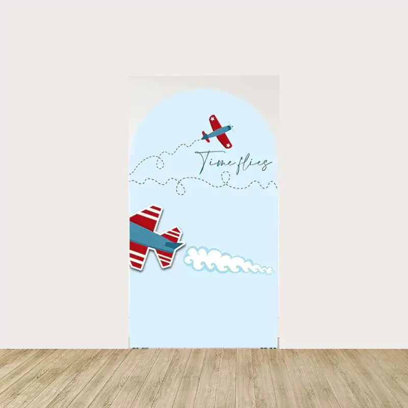 Arch panel with a light blue sky background, planes flying through clouds, and whimsical “Time Flies” script—perfect for aviation-themed parties.