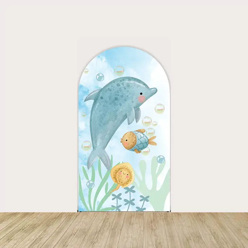 Arch panel with a happy dolphin, fish, seaweed, and bubbles in a soft watercolor ocean background—perfect for baby showers or sea-themed birthdays.