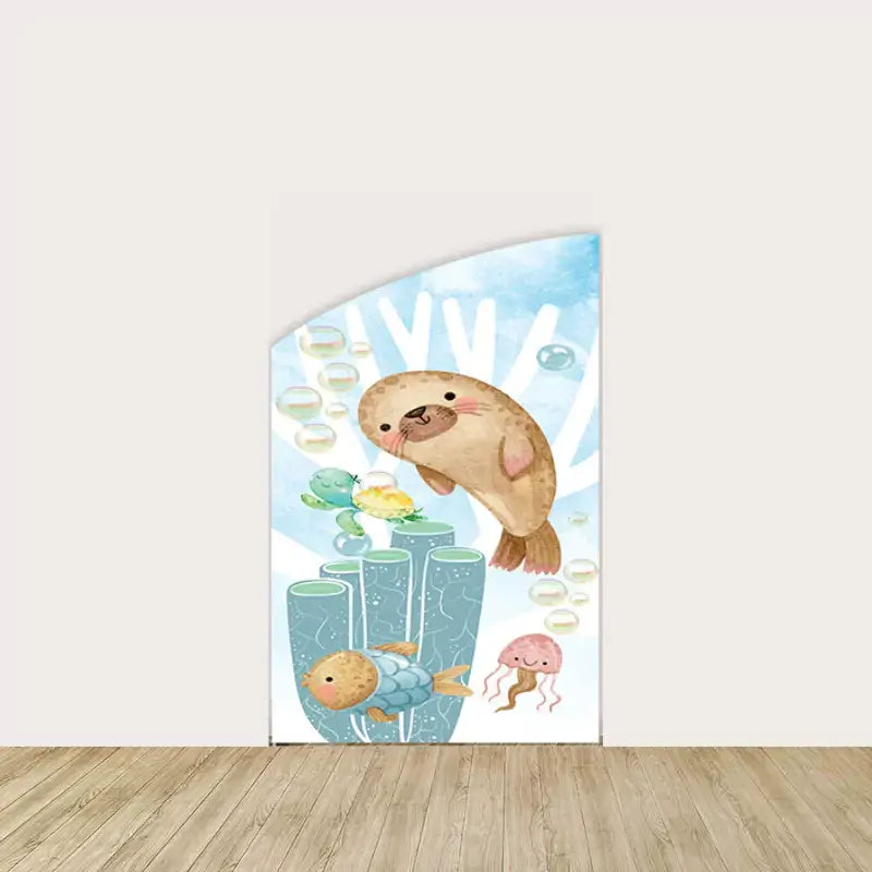 Arch panel featuring a smiling seal, sea turtles, coral reef, fish, and jellyfish in a bubbly underwater setting—great for ocean-themed parties.