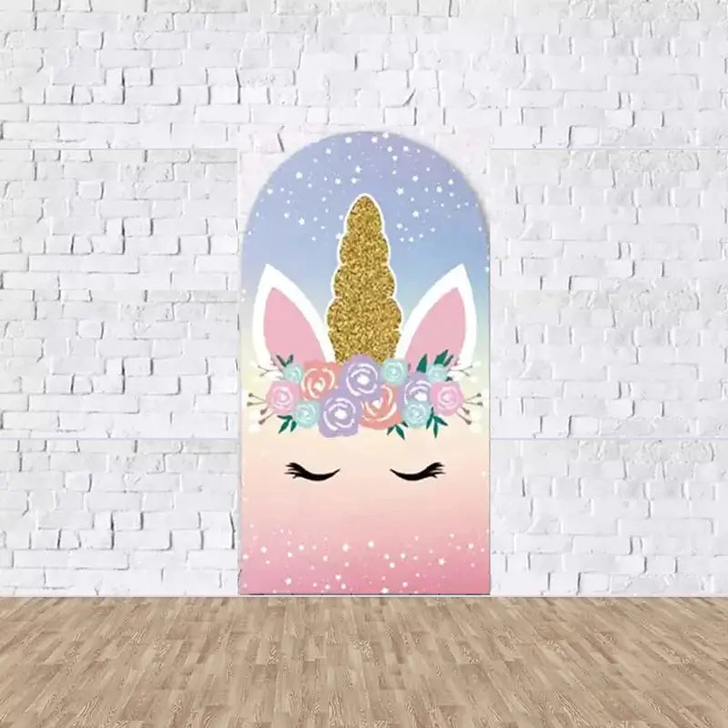 Center arch panel with a unicorn face, closed eyes, gold glitter horn, and pastel floral crown—set against a pink-to-blue starry gradient background.