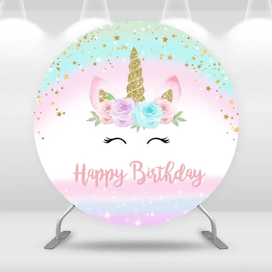 Whimsical unicorn birthday backdrop with pastel colors, gold glitter horn, and floral crown.